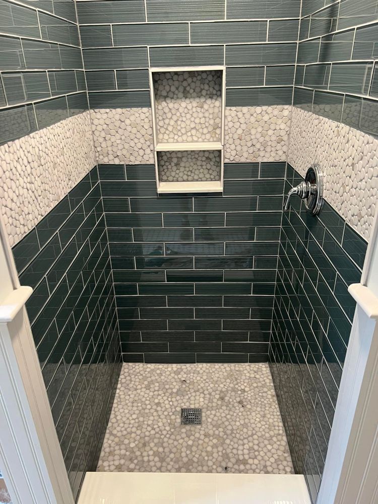 Transform your bathroom into a modern oasis with our expert renovation services. We offer custom designs, high-quality materials, and professional craftsmanship to create the perfect space for relaxation and functionality. for John Jepson Home Improvements in Pelham, NH