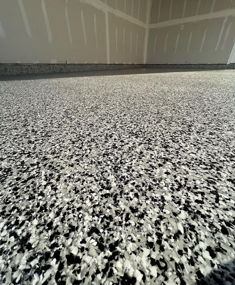 Our Flake Floors service combines durable epoxy coatings with decorative flakes for a slip-resistant, attractive finish. Homeowners considering metallic epoxy also appreciate this low-maintenance, long-lasting garage and basement flooring option. for Lone Wolf Coatings in Philadelphia, PA