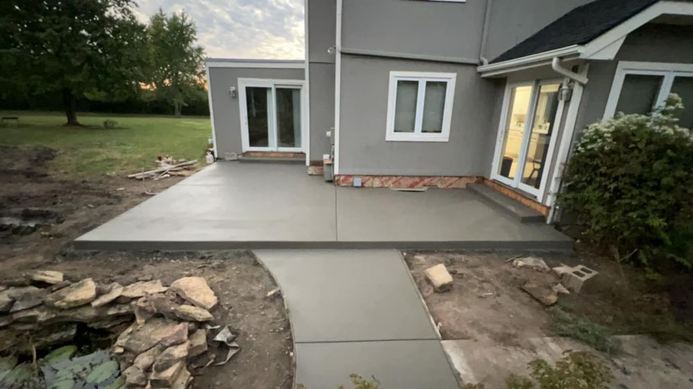 Transform your outdoor space with our expert Patio Design & Installation service. We create beautiful, durable patios tailored to your style and needs, enhancing both function and aesthetic appeal. for Premium Concrete Construction in Topeka, KS