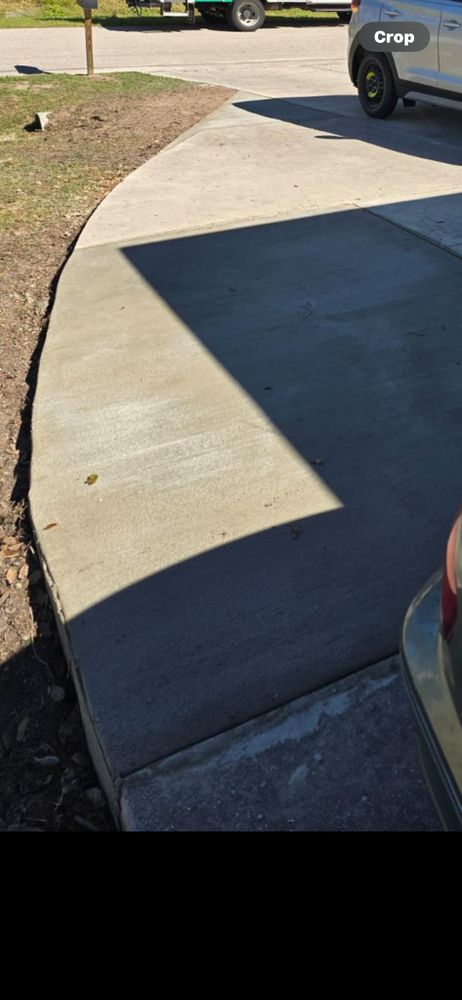 Enhance your home's safety and curb appeal with our expert concrete repair services, specializing in fixing cracks and chips to restore the durability and appearance of your driveways and pathways. for Nick of Time Tree Service in North Port, FL