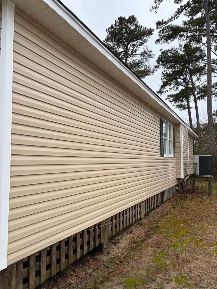 Softwash Cleaning for Homes in the Outer Banks and Surrounding Areas. Gently removes mildew, algae, and grime from siding, trim, and more—without damage. for Ocean Blue Softwash in Kill Devil Hills, NC