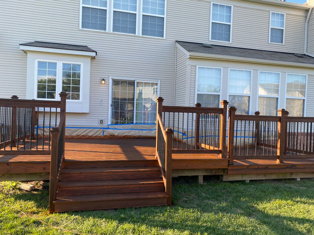 Our staining service adds a beautiful finish to your outdoor decks, fences, and siding, enhancing the natural beauty of wood while providing protection against the elements for long-lasting durability. for Mansour Contracting inc in Clarkston, MI