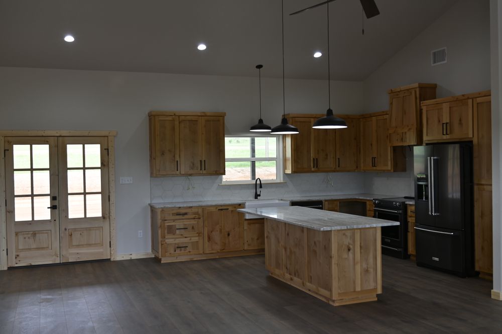 Tyler & Kalye for Herrmann Construction in Stephenville,  Texas