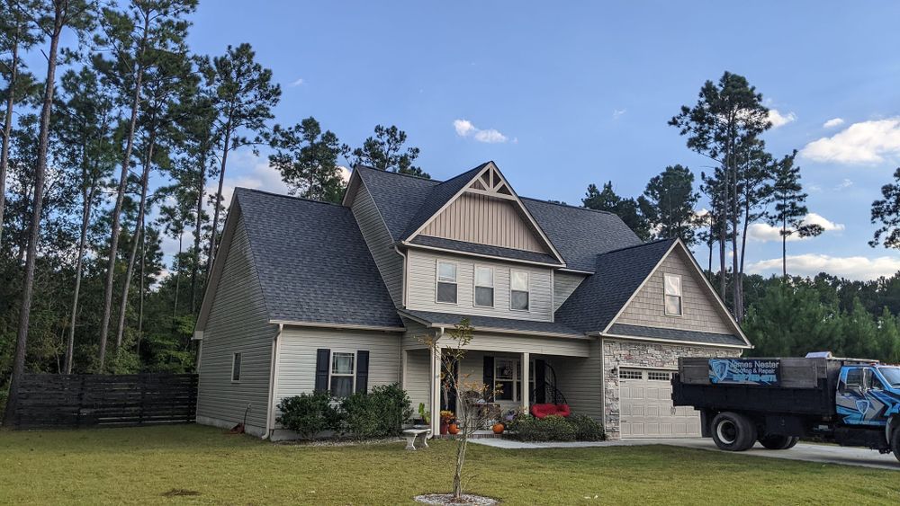 Discover how our expert roofing services can enhance your home's resilience and beauty. Explore additional offerings like insulation, gutter installation, and maintenance to safeguard your investment today! for James Nester's Roofing & Repair in Richlands, NC