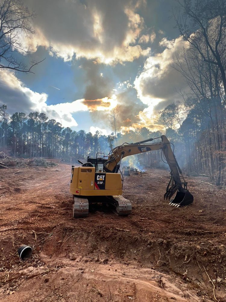 Our Land Clearing service efficiently removes unwanted vegetation, debris, and obstacles, preparing your property for construction or remodeling projects with precision to ensure a clean slate for your vision. for Southern Roots Services in Carrollton, GA