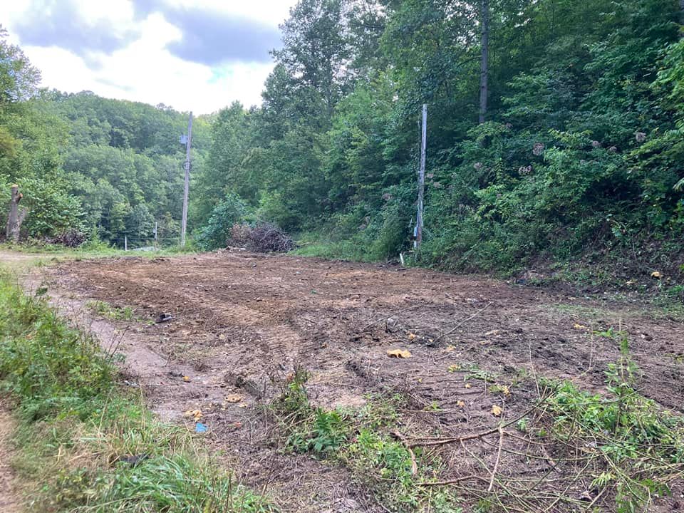 Our Leveling service ensures your property is properly graded and leveled, creating a stable foundation for future construction projects. Trust us to achieve precise and efficient results every time. for Kidd Excavating LLC in West Liberty, KY