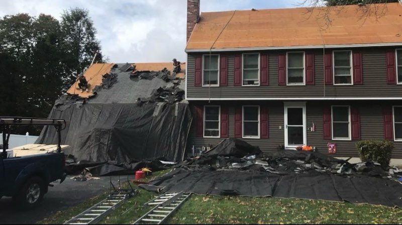 Our roofing repairs service ensures your home's safety, specializing in chimney repairs to address leaks and structural issues, enhancing durability and protecting your family from weather-related damage. for Rainguard Masonry and Roofing in Lowell, MA