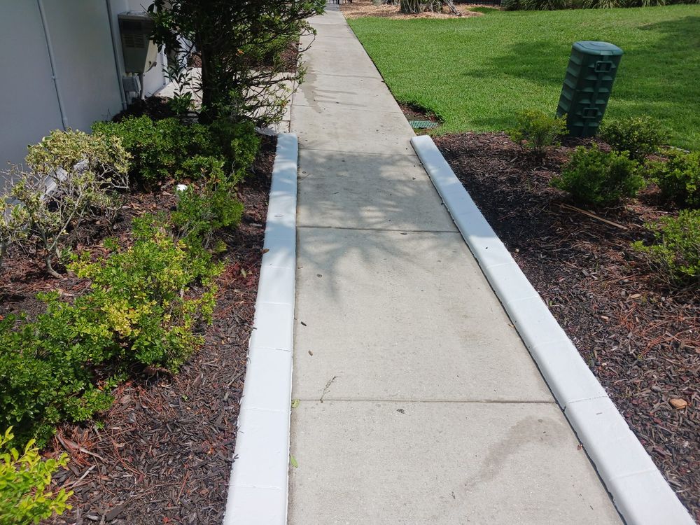 Enhance your home's curb appeal with our expert driveway painting service, offering durable finishes and a range of colors to revitalize and protect your driveway against weather elements. for Bradley Bradshaw Painting in Christmas, FL