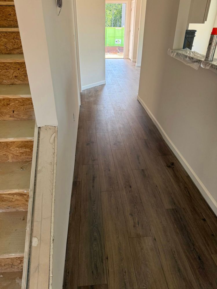 Transform your home with our LVP flooring service, offering stunning wood flooring alternatives that combine elegance and durability. Enjoy the rich look of authentic wood without compromising on performance or maintenance. for Dr J Flooring Llc in Greenville, South Carolina