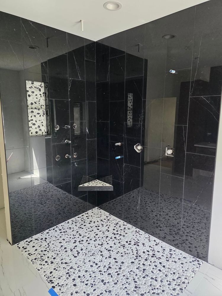 Transform your bathroom with our custom showers, designed to fit your style and needs. We offer expert installation and high-quality materials for a beautiful, durable finish that enhances any home. for Smart Flooring in Sunrise Beach, MO