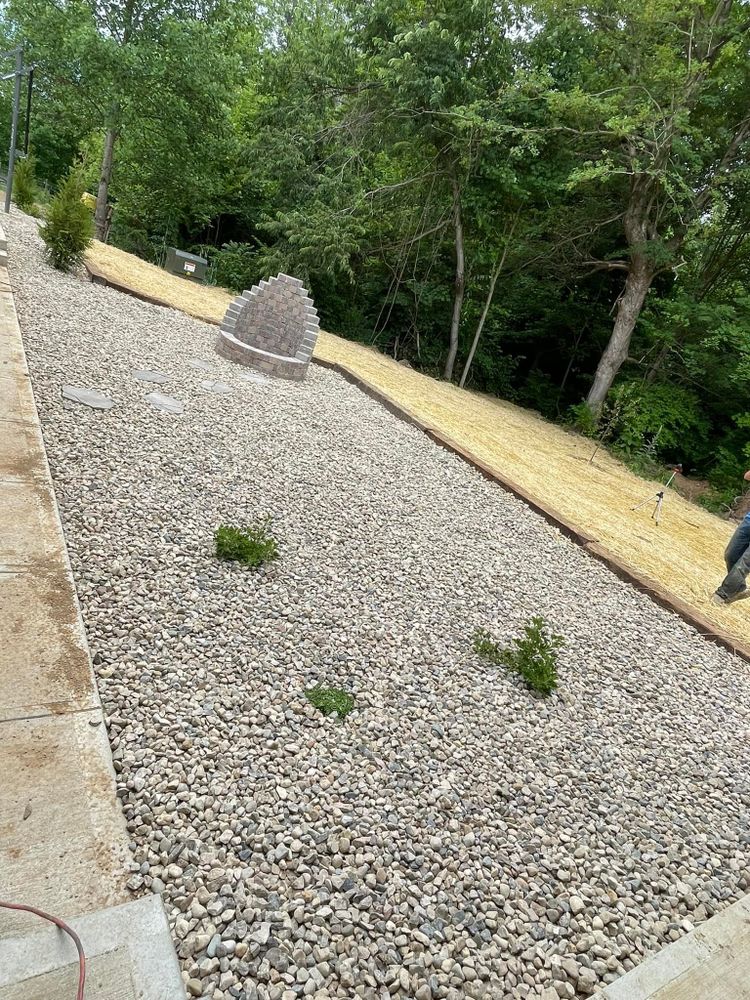 Transform your outdoor space with our expert hardscape design services, creating beautiful patios, walkways, and retaining walls that enhance functionality and aesthetic appeal for a stunning backyard retreat. for Chapmans Lawncare and Landscaping in Connersville, IN