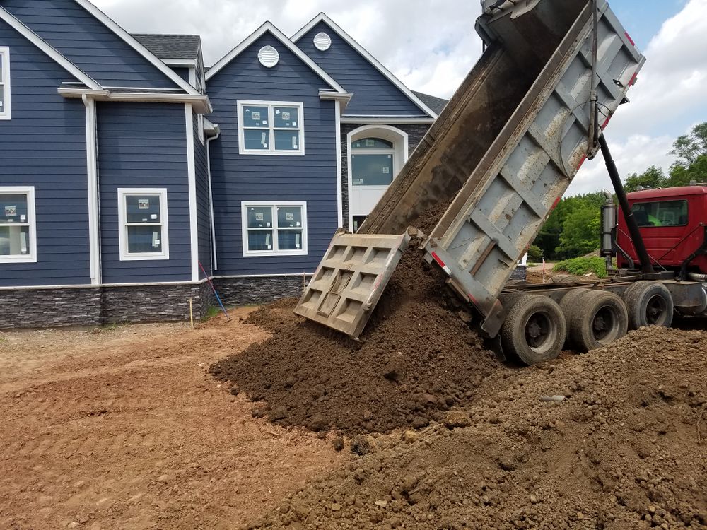 Our Fill Dirt Deliveries service ensures timely, reliable delivery of quality fill dirt for your landscaping or construction needs, enhancing site stability and preparing grounds efficiently with eco-friendly solutions. for Preferred Excavating & Demolition in Somerset County, NJ