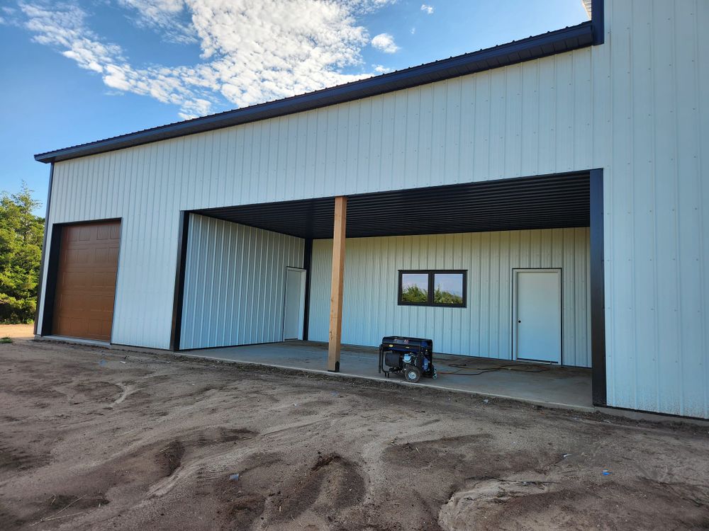 Our Post-Frame Buildings service offers homeowners a cost-effective and durable solution for creating storage sheds, barns, garages, or workshops using high-quality steel construction techniques for long-lasting structures. for Midwest Structures in Pretty Prairie,, KS