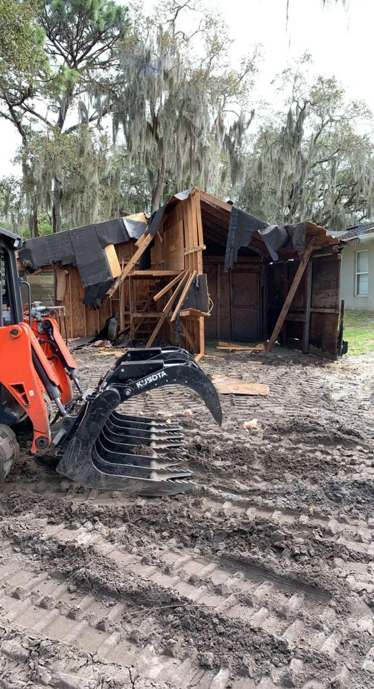 Our Land Clearing service efficiently and safely removes trees, underbrush, and debris from your property to create a clean canvas for landscaping or construction projects. Trust us for expert solutions. for All Track Construction in Mims, FL