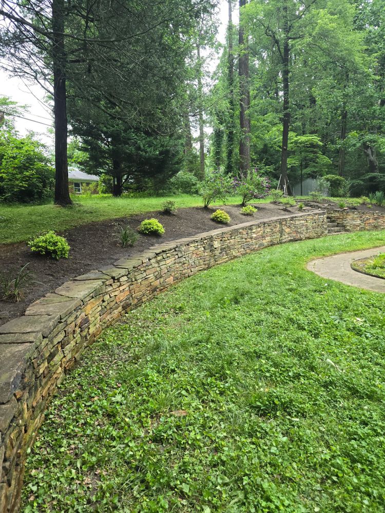 Our retaining wall construction service enhances your landscape's functionality and beauty, providing durable solutions for soil erosion while creating elegant terraces that maximize usable space in your outdoor environment. for CLH Services in White Marsh, MD