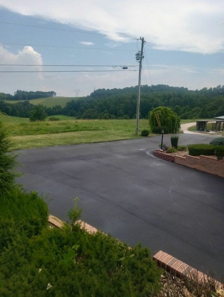 Our Asphalt Repair service revitalizes your driveway, addressing cracks and potholes to enhance safety and beauty. Trust our expert team for durable, high-quality results that improve your home's curb appeal. for Asphalt Animals in Sevierville, TN