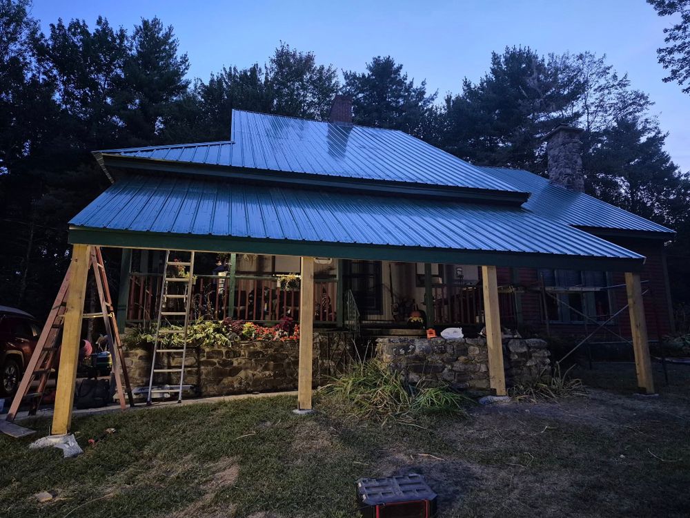 Our metal roofing service offers homeowners durable, energy-efficient solutions that enhance your home's aesthetic and value. Enjoy long-lasting protection with customizable styles to suit any architectural design or personal preference. for Glennon's Roofing in Rochester, NH
