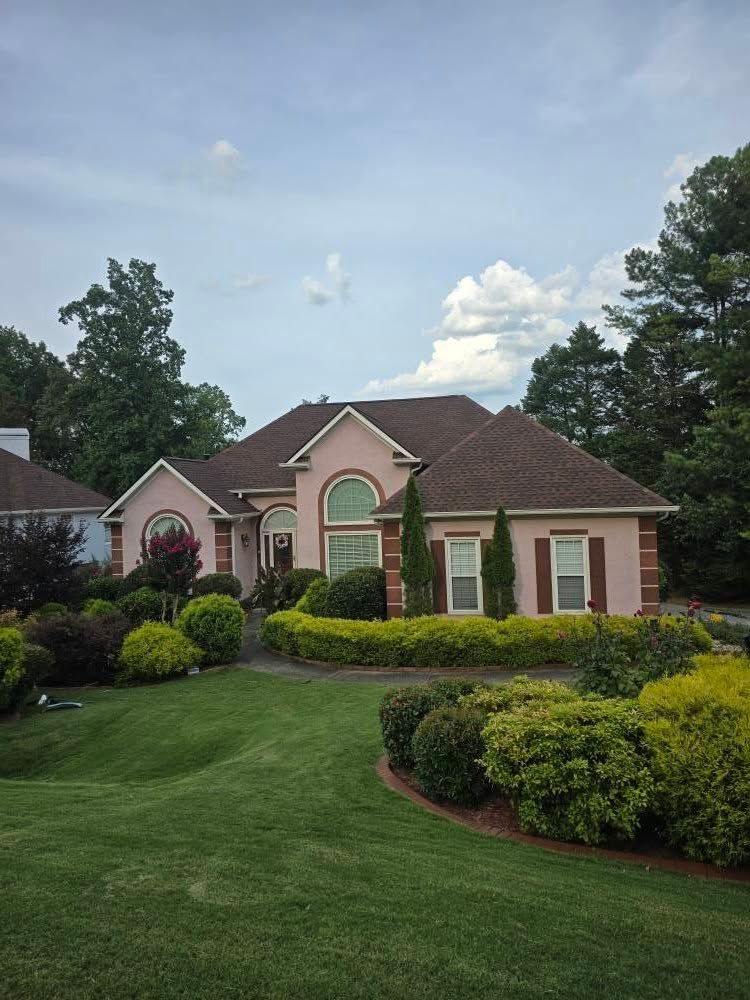 Our Roofing Replacement service removes old, damaged roofing and installs durable, weather-resistant materials that protect your home, improve curb appeal, boost energy efficiency, and provide lasting peace of mind. for ER Construction in Rockmart, GA