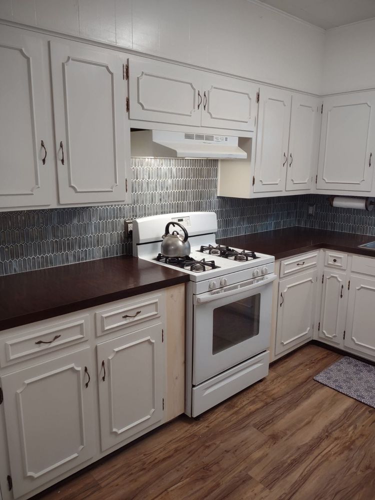 Enhance your kitchen's aesthetic with our expert tiling services. We offer customized backsplash designs, durable materials, and precise installation to transform your space into a stunning focal point for any home. for Pipkin's Flooring in Liberal, KS