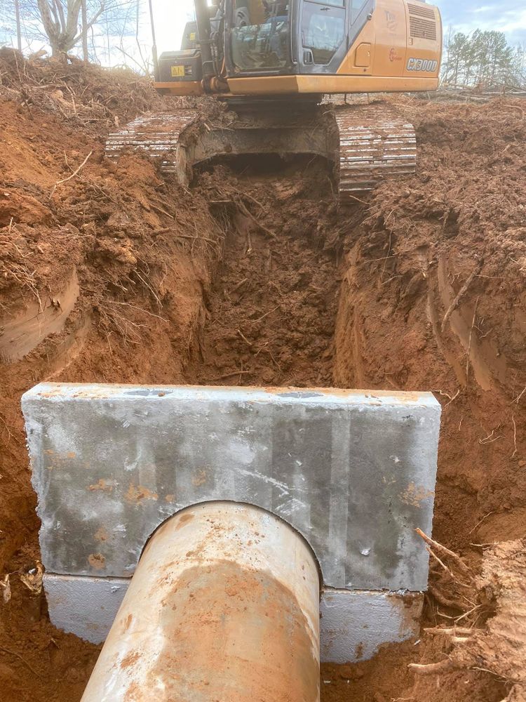 Our Sewer & Water Lines service ensures reliable installation, repair, and maintenance of essential underground utilities, using advanced techniques to guarantee efficient operation and protect your home's plumbing infrastructure. for Twins Grading in Spartanburg County, SC