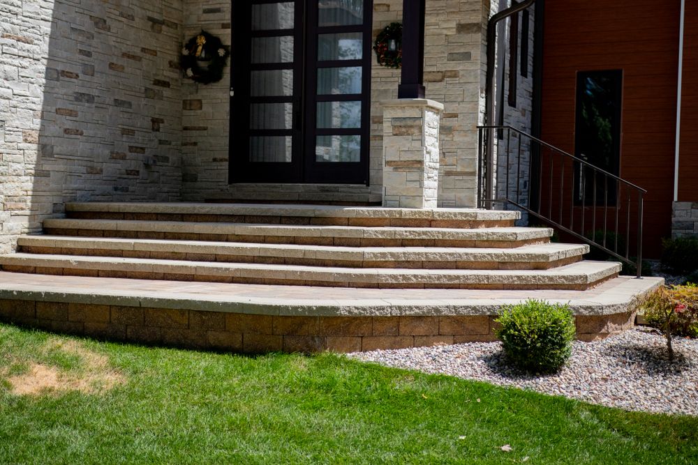 Enhance your outdoor space with our expert retaining walls Installation, providing stability, erosion control, and aesthetic appeal. Let us craft functional, beautiful solutions tailored to your landscape's unique needs. for Sunstone Construction in Oakland County, MI