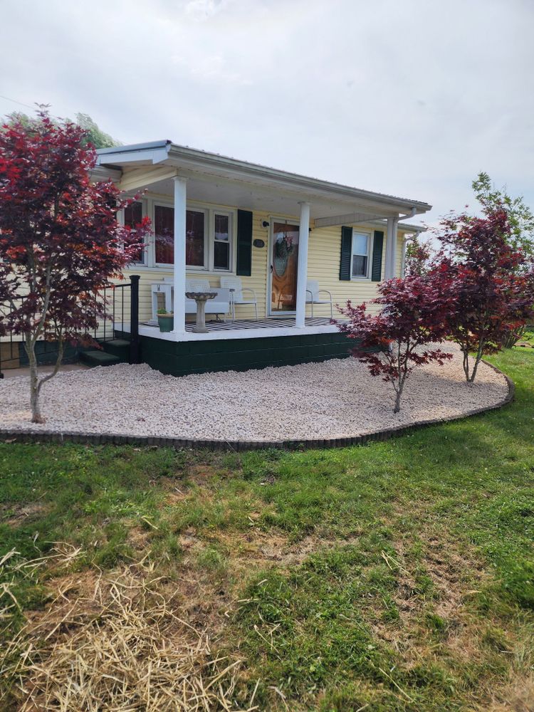 Transform your outdoor spaces with our professional landscaping services, including expert mulch or rock installation. Enhance your garden's beauty and health while ensuring long-lasting protection for plants against weeds. for Williams Lawn & Land in Sharps Chapel, TN