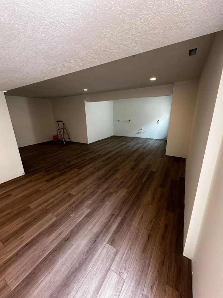 Transform your home with our expert flooring services. From hardwood to tile, we provide professional installation and quality materials, ensuring durable and beautiful floors that enhance your living space. for AKP Construction in Elwood, UT