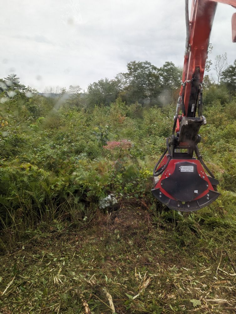 Our brush mowing and forestry mulching service clears overgrown fields, orchards, road side trimming, pond or river bank management and much more quickly and safely, improving access and appearance. for Krahn Excavation in Oxford County, ME