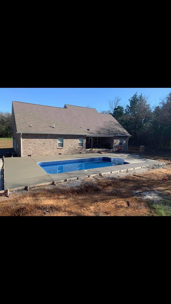 Elevate your outdoor living space with our expert patio design and installation service. Our team will work closely with you to create a beautiful and functional patio that enhances your home. for Tac Concrete in Shelbyville, TN