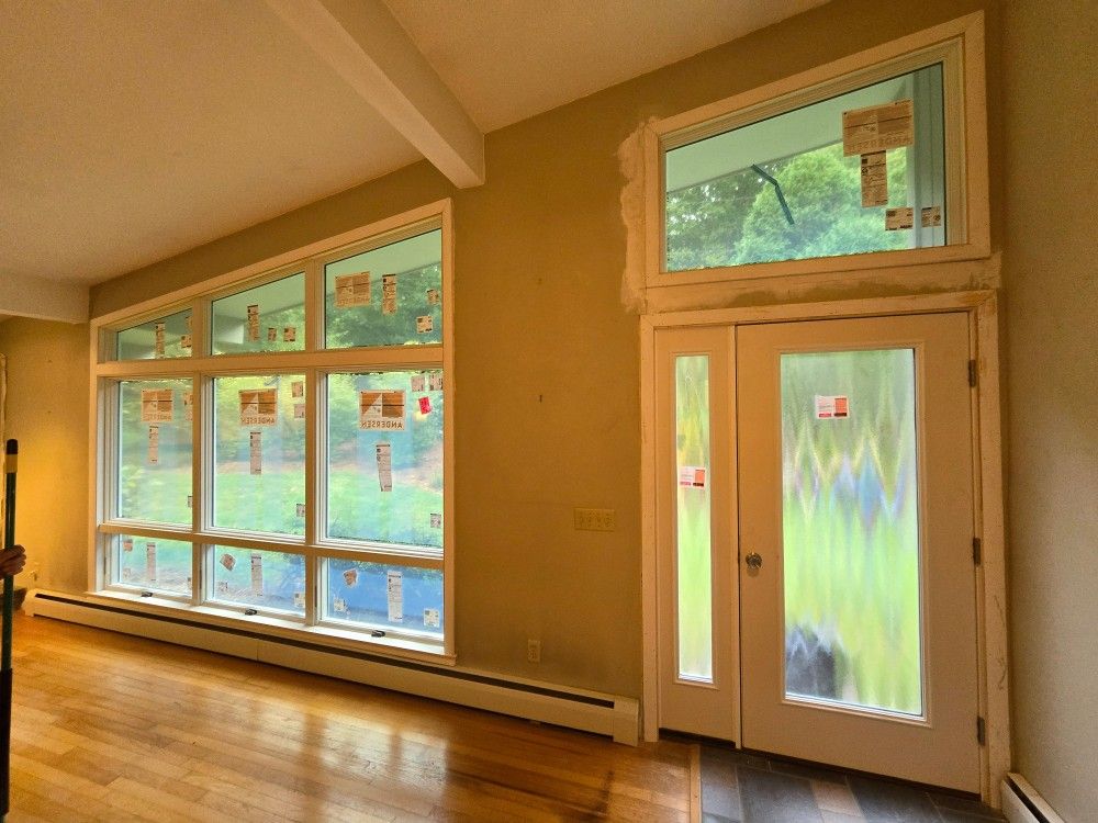 Enhance your home's energy efficiency and aesthetics with our expert windows and doors service, providing quality installation and a wide selection to suit any style or budget. for Coastline Property Renovations in West Kingston, RI