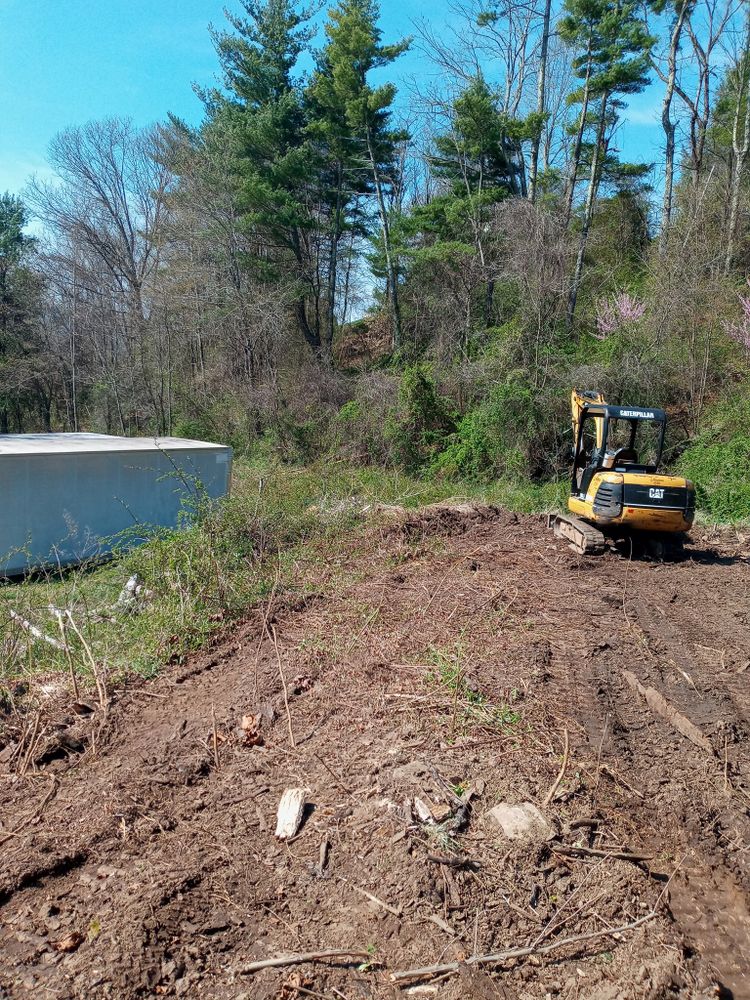 Quality Land Management and septic service team in Green Mountain, NC - people or person