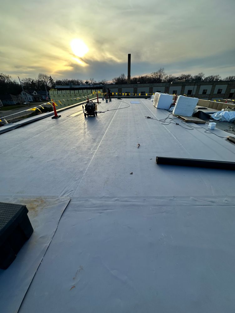 Our Conklin Cool Roofing singly ply TPO System service offers energy-efficient roofing solutions to reduce costs and extend the lifespan of your roof, providing effective protection and long-term savings for roofing repairs. for Watershed Commercial Roofing in Grand Rapids, MI