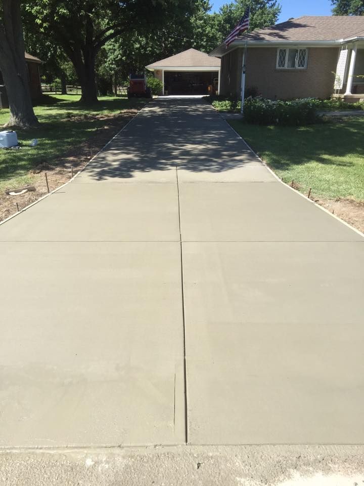 Our Concrete Slab Construction service involves the expert pouring and leveling of concrete to create durable, long-lasting slabs for your home's foundation, driveway, patio or other outdoor features. for Paul Turner Concrete & Excavating in Toledo, OH