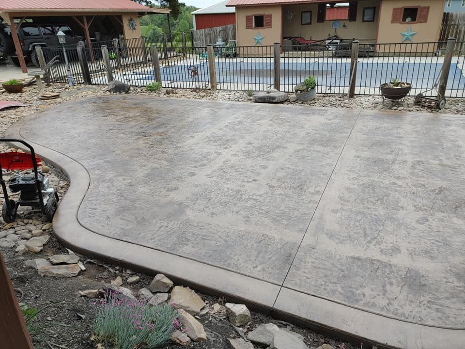 Transform your outdoor space with our expert stamped concrete installation, offering beautiful, durable surfaces that mimic natural stone or brick at a fraction of the cost, enhancing both aesthetics and value. for Gunter's Concrete in Newport, TN