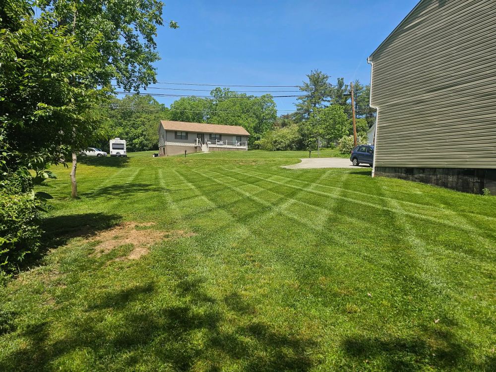 Enhance your home's curb appeal with our expert mowing service, ensuring a pristine lawn. We offer precise trimming, consistent maintenance schedules, and attention to detail for a lush and tidy landscape. for Fields Lawn Care in Appomattox, VA