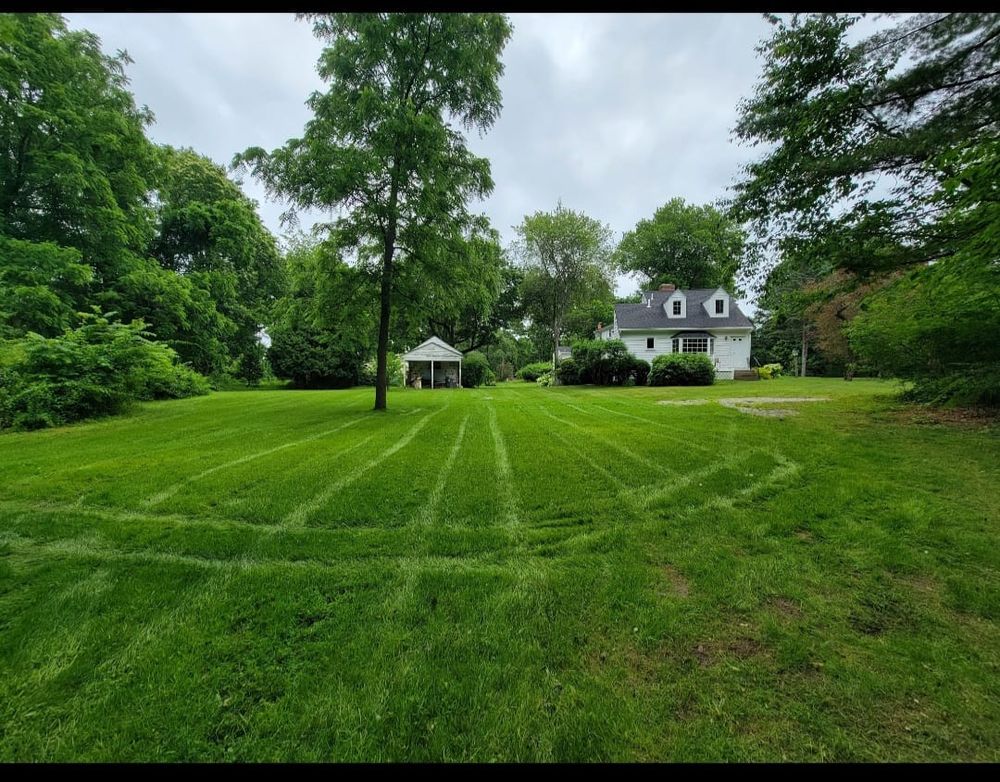 Our mowing service ensures a pristine lawn with precise trimming, attention to detail, and reliable scheduling. We enhance your property's curb appeal while saving you time for other activities you enjoy. for Romero Máster Landscaping in Lunenburg, MA