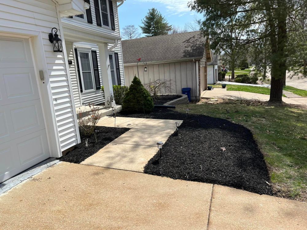 Our Mulch Installation service will improve the health and appearance of your garden beds by providing a protective layer that conserves moisture, suppresses weeds, and adds aesthetic value to your property. for Trust Lawn and Landscape  in Pacific, MO