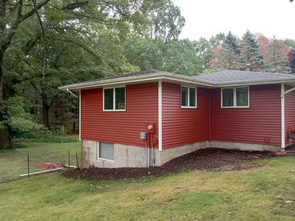All Photos for Buck's Exteriors in Manistee, MI