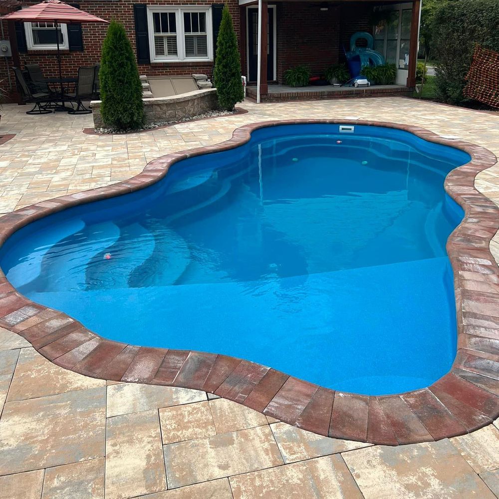 Enhance your pool area with our expert Pool Deck Paving service, offering durable and stylish solutions that elevate aesthetics while ensuring safety and comfort for your outdoor leisure space. for Green Gable Contracting in Bergen County, NJ