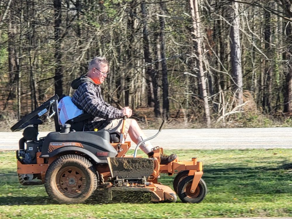 Enhance your lawn's appearance with our professional edging service, creating clean and precise borders between grass, flower beds, and walkways for a beautifully defined landscape you'll love. for Teacher Man Lawn Care in Easley, SC