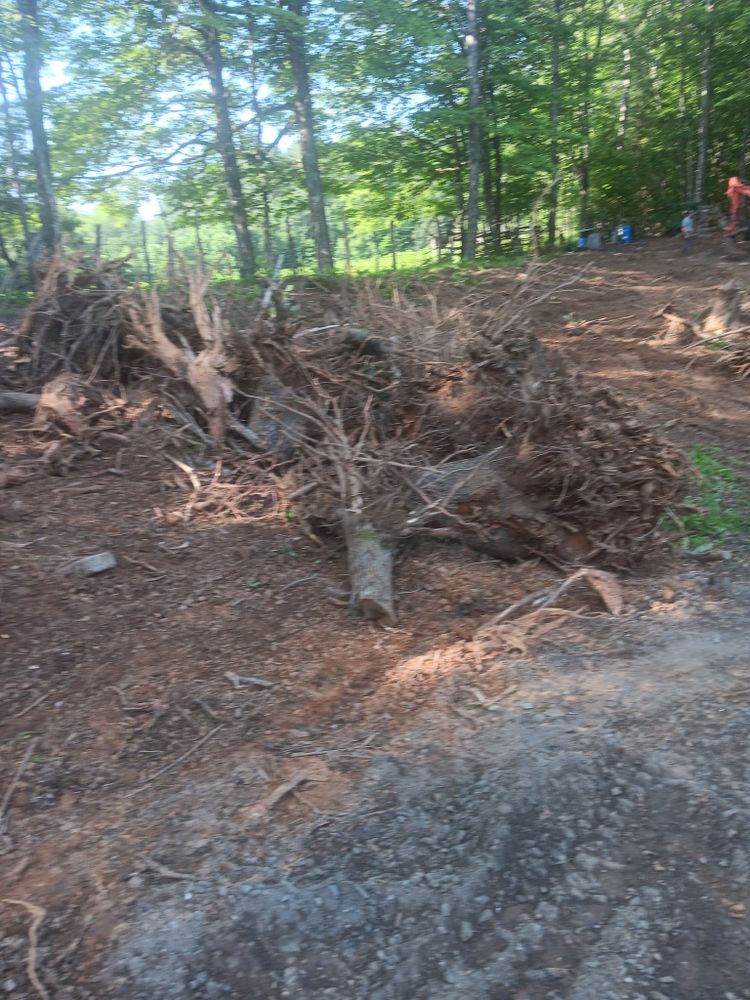 Our Land Clearing & Demolition service ensures safe, efficient removal of unwanted structures and vegetation, preparing your site for new projects with precision and care. Transform your property seamlessly and stress-free. for PCC Land Works in Marshall, NC