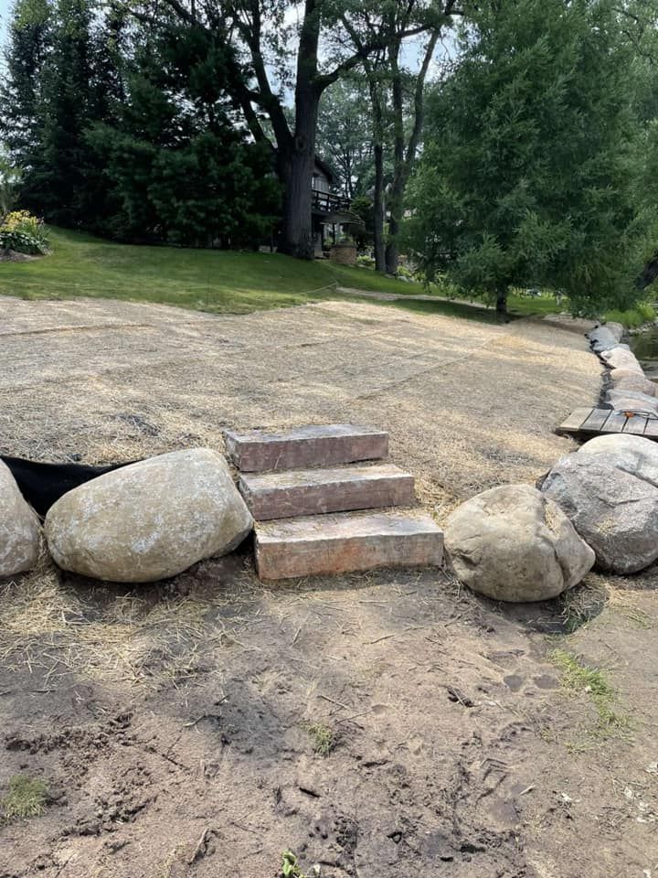 Our Retaining Wall Construction service offers expert installation of sturdy walls to prevent soil erosion and create visually appealing terraced landscapes, enhancing both the functionality and aesthetic appeal of your property. for R&R Outdoor Services LLC  in Lino Lakes, MN