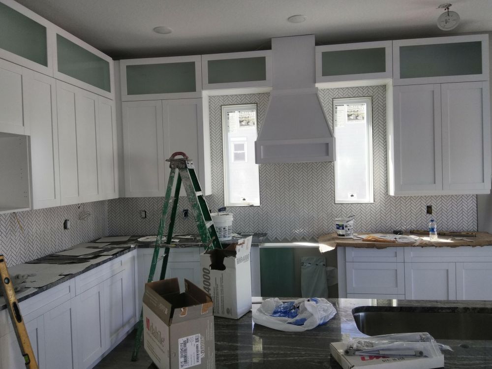 Enhance your kitchen's aesthetic with our expert backsplash tiling service, offering personalized designs and professional installation to complement any style. Transform your space effortlessly with durable, high-quality tiles crafted for beauty and functionality. for Classic Tile & Stone Installation in Spring Hill, FL