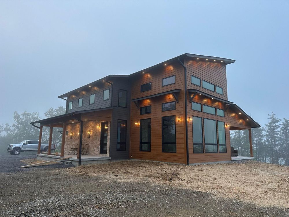 Our New Home Construction service provides seamless integration from excavation to completion, ensuring a stress-free build experience with expert craftsmanship, timely delivery, and personalized solutions tailored to your vision and needs. for Phillips Construction and Excavating in Seymour, TN