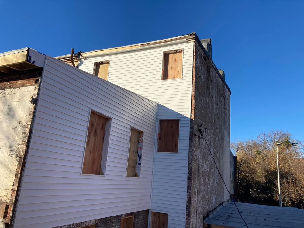 Enhance your home's exterior with our top-quality vinyl siding services, providing durability and energy efficiency. Trust our expert team to deliver stunning results that protect and beautify your property for years. for Universal Builders in Baltimore, MD