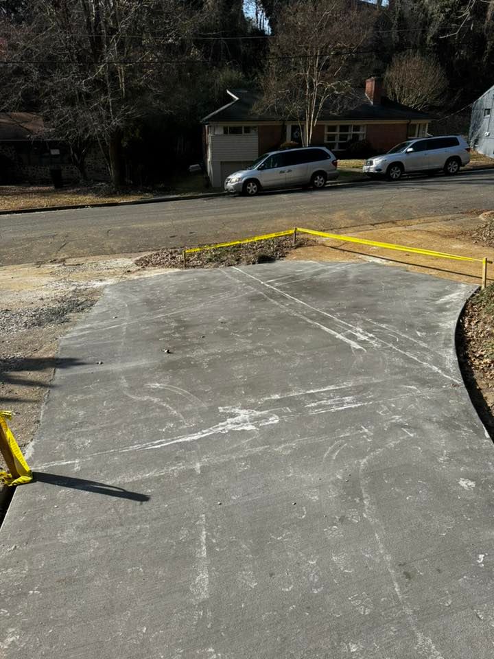 Our Concrete Work service delivers durable slabs, driveways, and pads with precise site prep. Using a skid steer loader, we create smooth, reliable surfaces built for long-term performance. for Hunt’s Hauling & Landworks LLC in Danville, VA