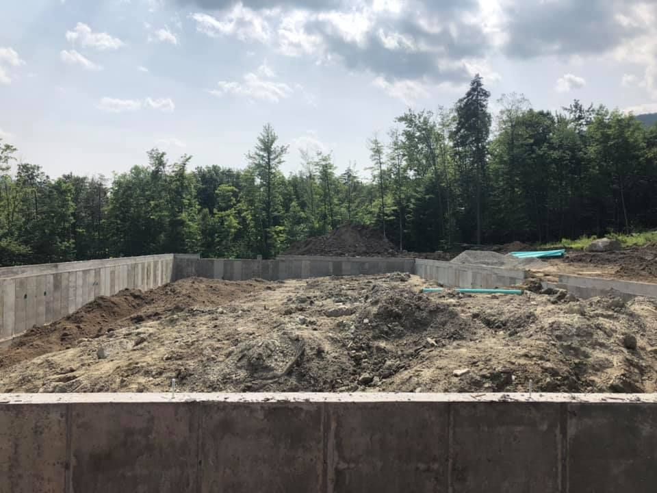 Our Site Preparation service includes clearing and grading land for construction projects, ensuring a level and stable foundation. Trust us to prepare your property efficiently and professionally for your project's success. for Andy Naylor Excavation in Stowe, VT