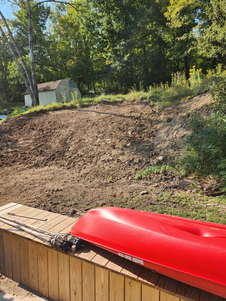 Our Brush Hogging service efficiently clears overgrown vegetation and brush on your property, ensuring a clean and well-maintained landscape without the hassle of manual labor or equipment. for Simz Excavating & Plowing LLC in Warren, PA