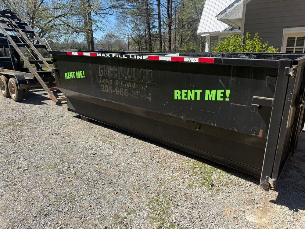 experience hassle-free waste disposal with our roll off dumpster rental service, providing convenient and efficient solutions for homeowners managing renovations, cleanouts, or landscaping projects. Simplify your cleanup today! for Greenwood Lawn & Landscaping LLC in Talladega, Alabama