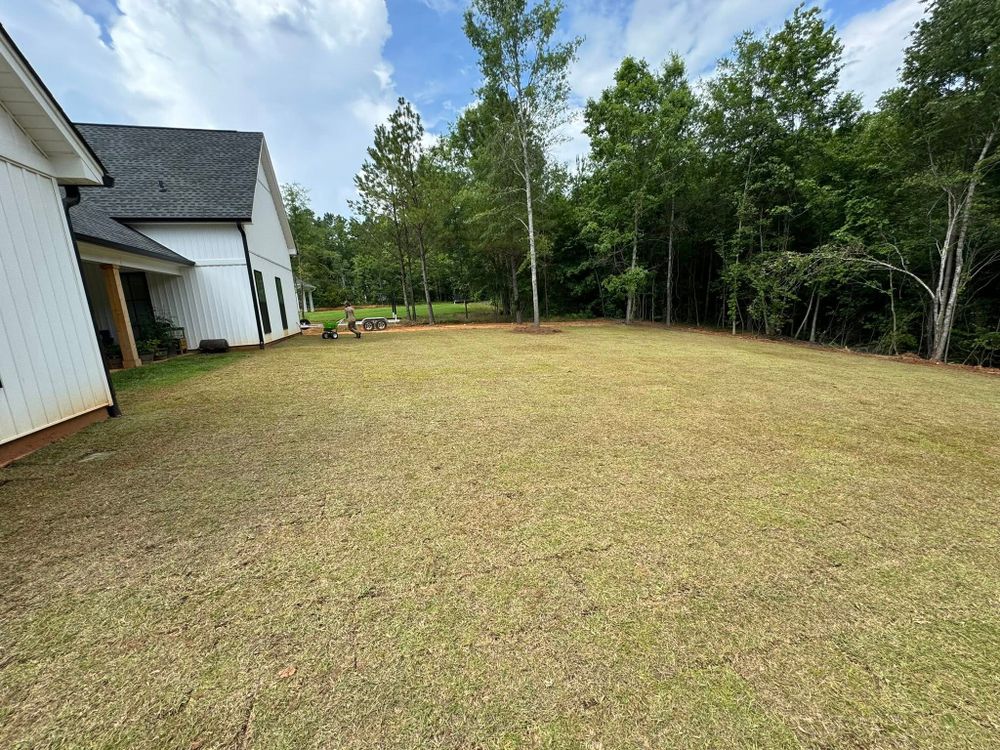 Transform your outdoor space with our expert sod install services, ensuring lush, green lawns. Complement this with elegant stone veneer installation for a stunning and durable landscape upgrade. for Trophy Outdoor Solutions in Lexington, SC